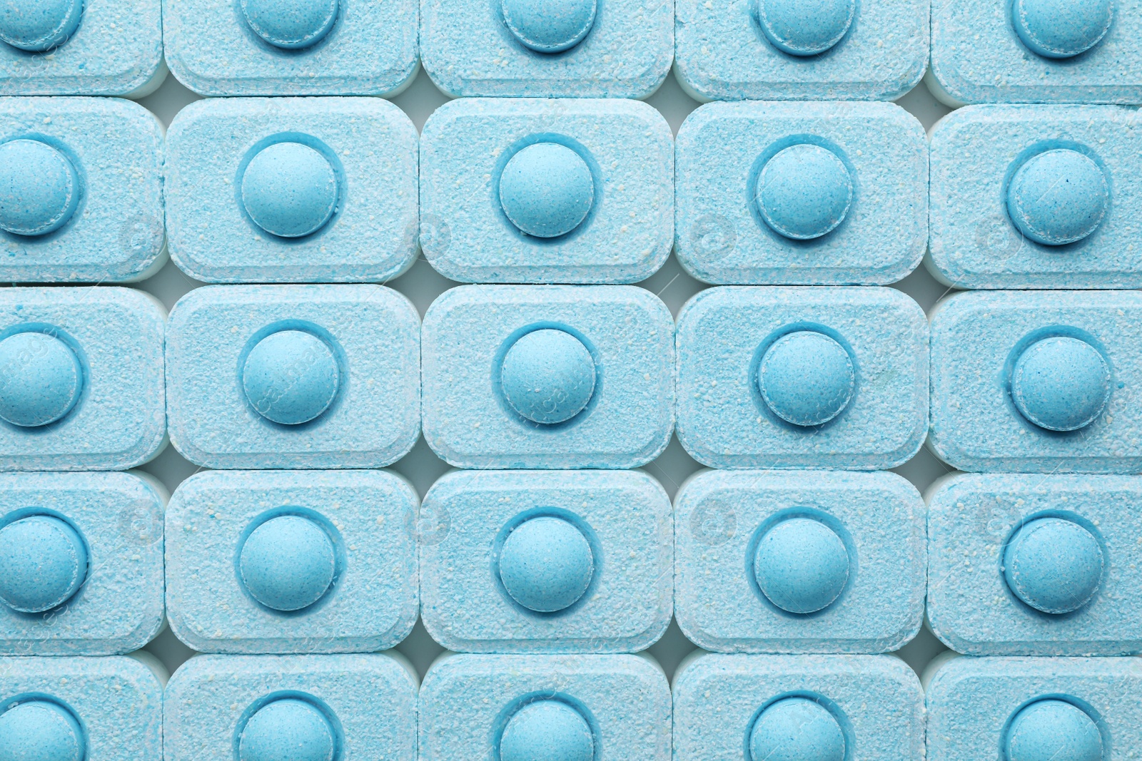 Photo of Many water softener tablets as background, top view
