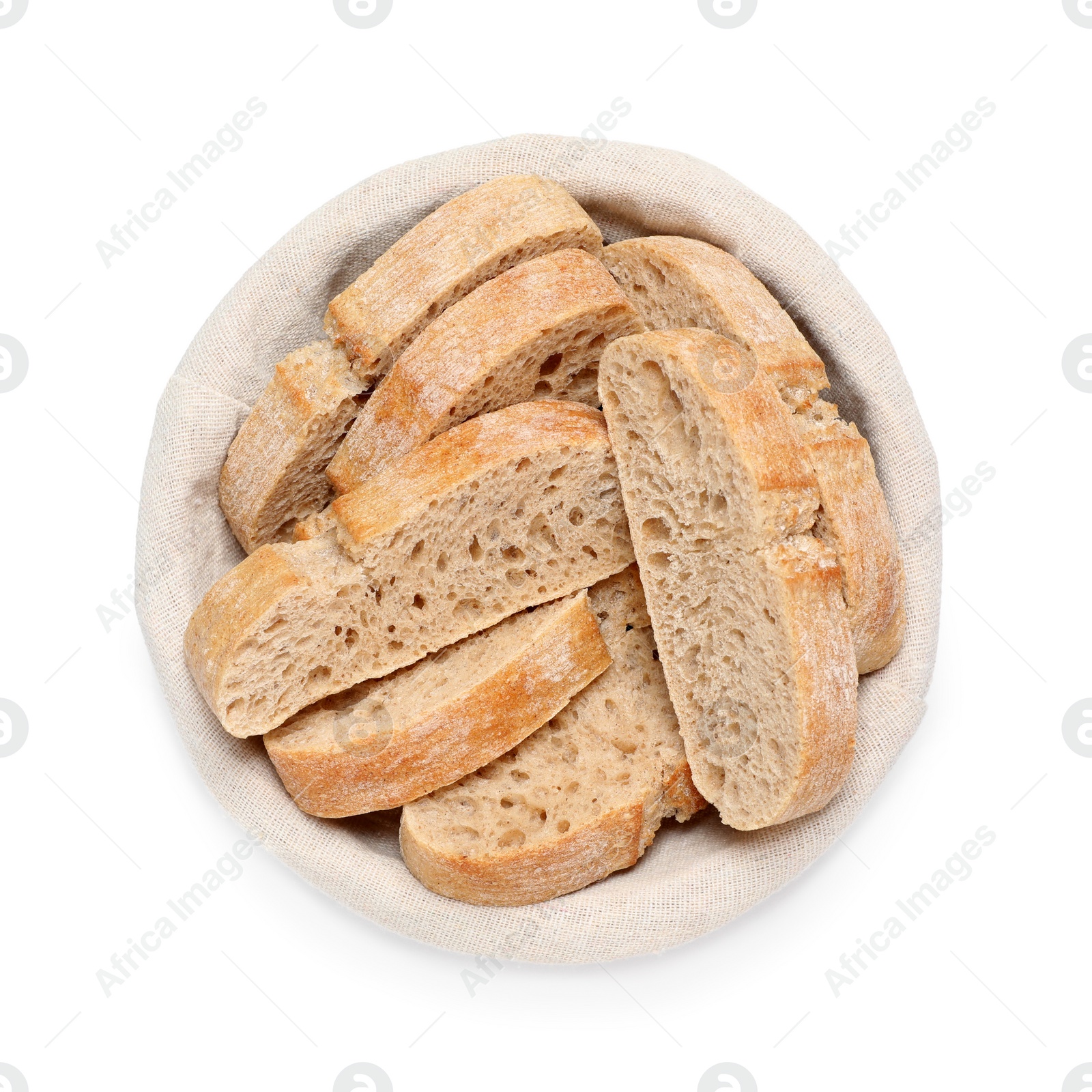 Photo of Cut delicious ciabatta in wicker basket isolated on white, top view