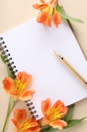 Photo of Guest list. Notebook, pen and beautiful flowers on beige background, flat lay. Space for text