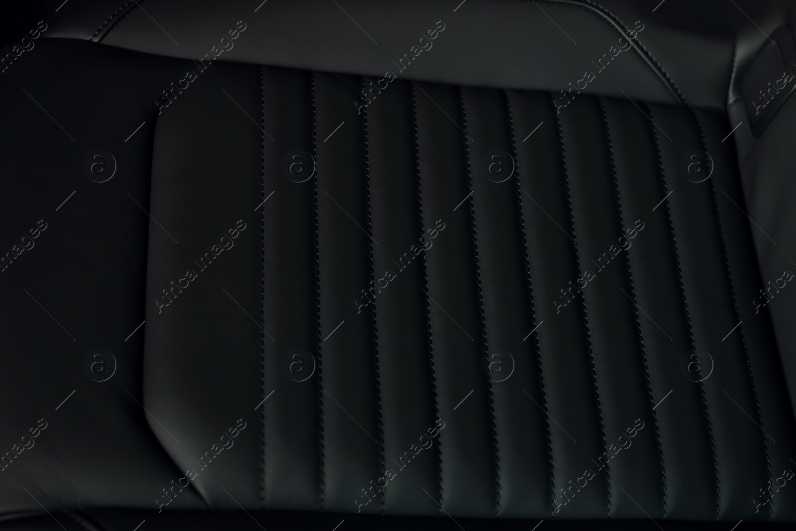 Photo of Car seat with leather upholstery, closeup view