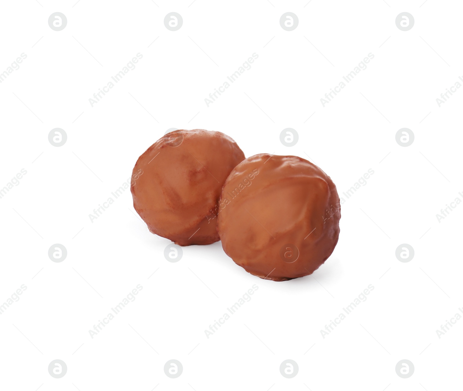 Photo of Two tasty chocolate candies isolated on white