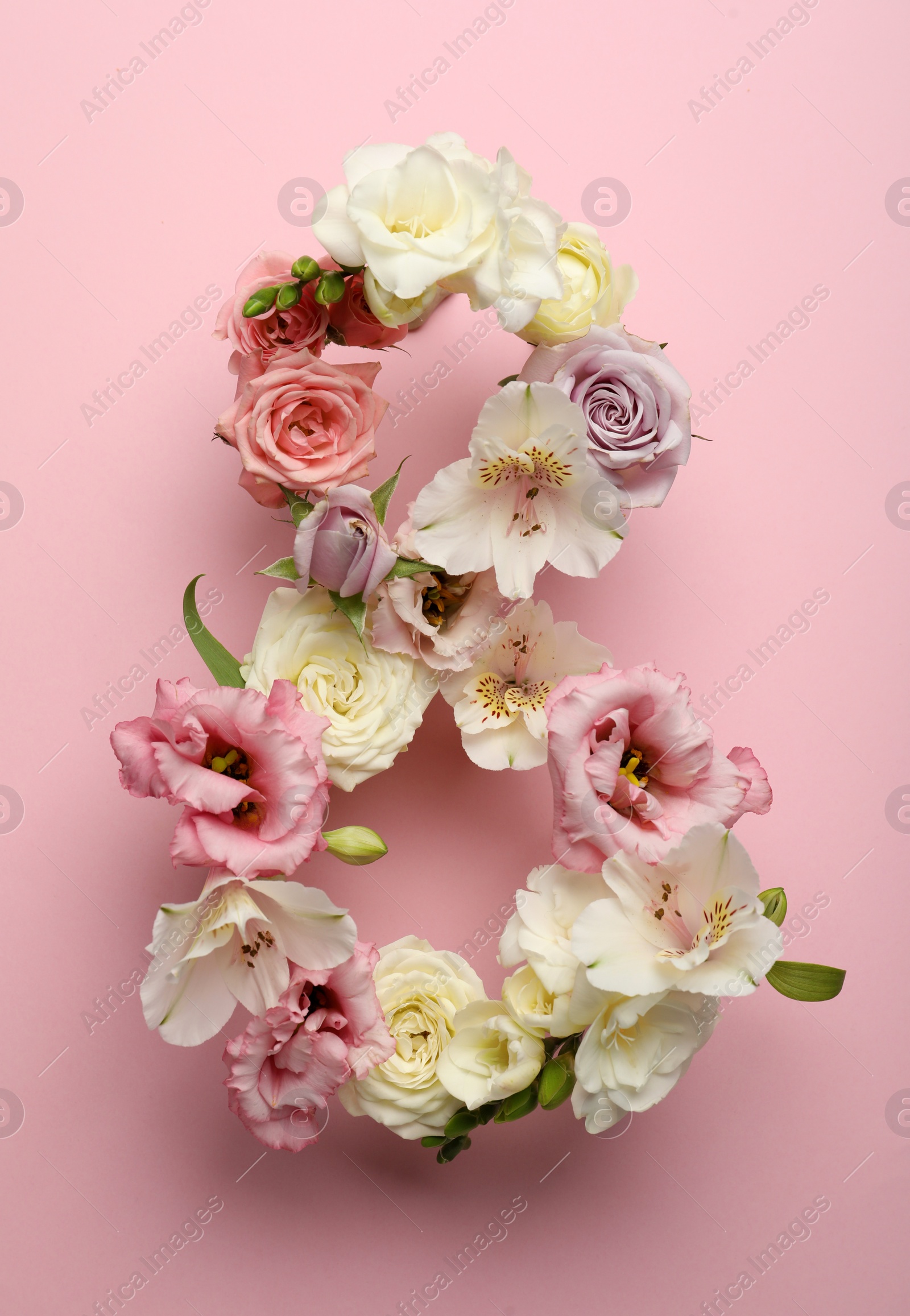 Photo of Number 8 made of beautiful flowers on pink background, flat lay. International Women's day