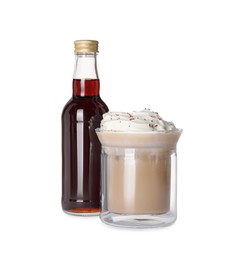 Photo of Bottle of delicious syrup and glass of coffee isolated on white