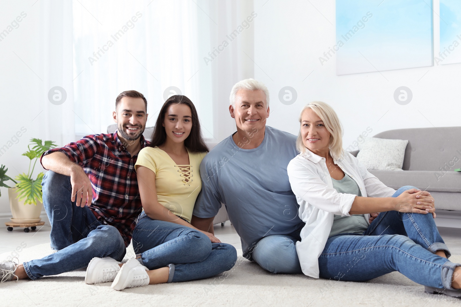 Photo of Happy family at home. Reunion of generations