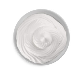 Photo of Fresh whipped cream in bowl isolated on white, top view