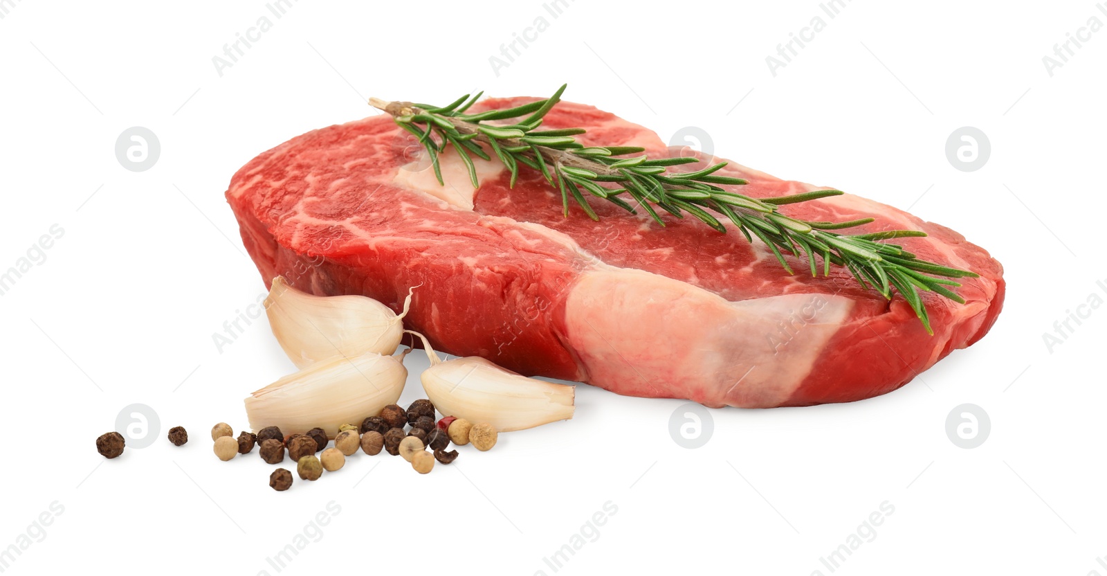 Photo of Raw beef steak and spices isolated on white