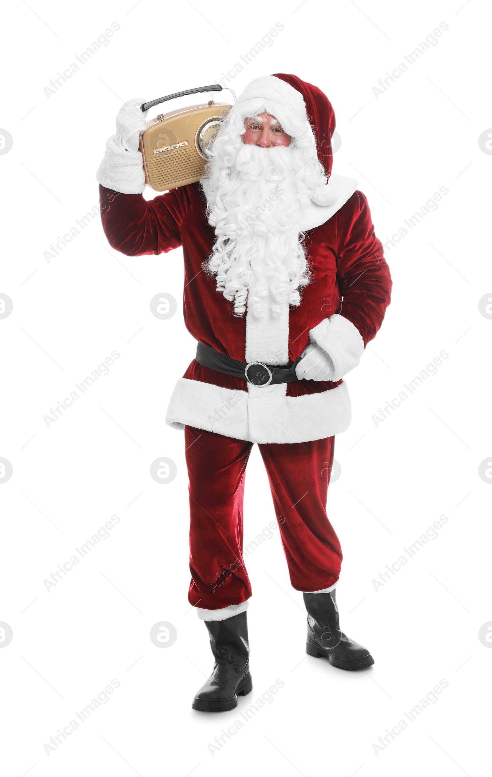 Photo of Santa Claus with vintage radio on white background. Christmas music