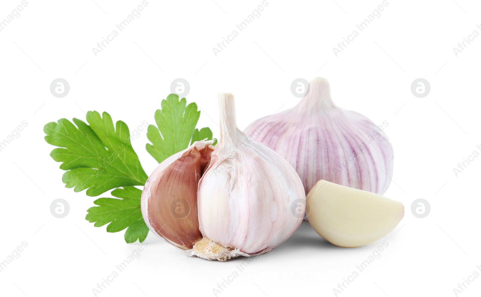 Photo of Fresh garlic and parsley on white background