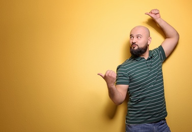 Photo of Portrait of young man on color background