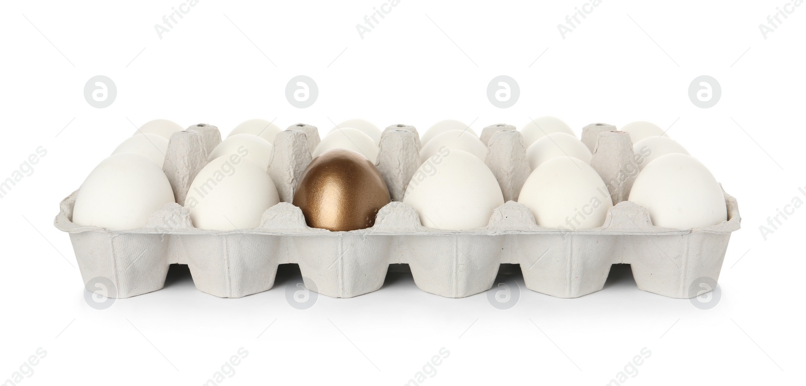 Photo of Egg carton with golden egg among ordinary ones on white background