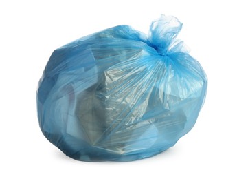 Photo of Blue trash bag filled with garbage isolated on white