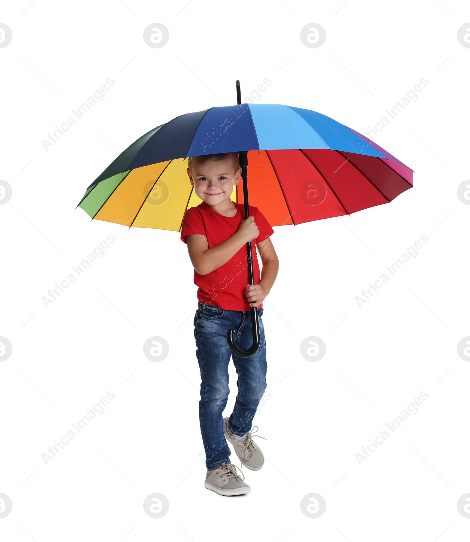 Photo of Little boy with rainbow umbrella on white background