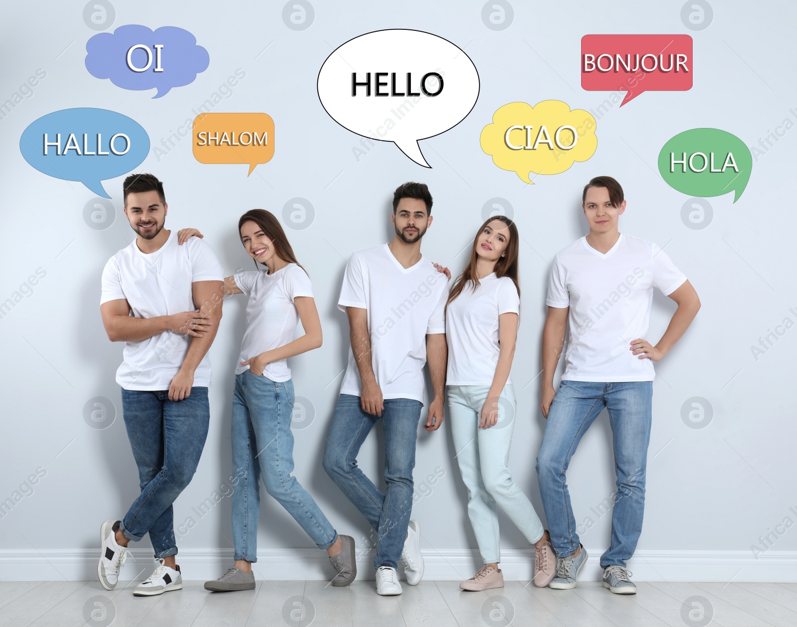 Image of Happy people posing near light wall and illustration of speech bubbles with word Hello written in different languages