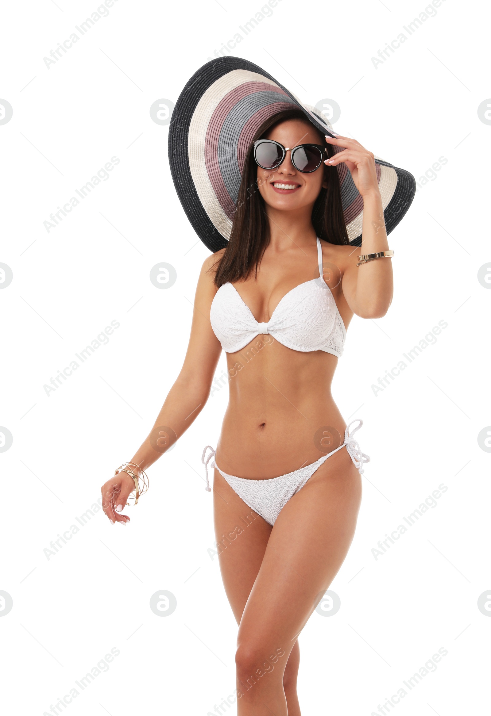 Photo of Pretty sexy woman with slim body in stylish bikini on white background