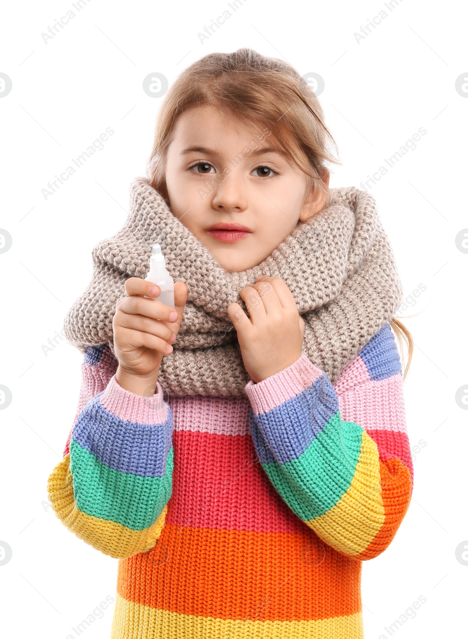 Photo of Sick little girl with nasal spray on white background