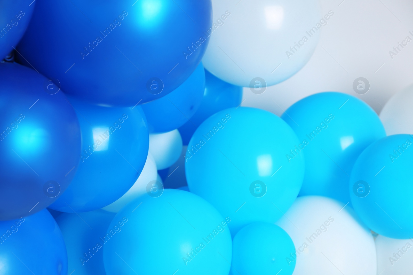 Photo of Many color balloons as background, closeup. Party decor