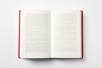 Open book on white background, top view