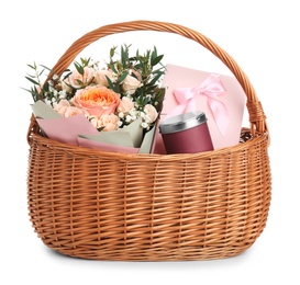 Wicker basket with different gifts on white background