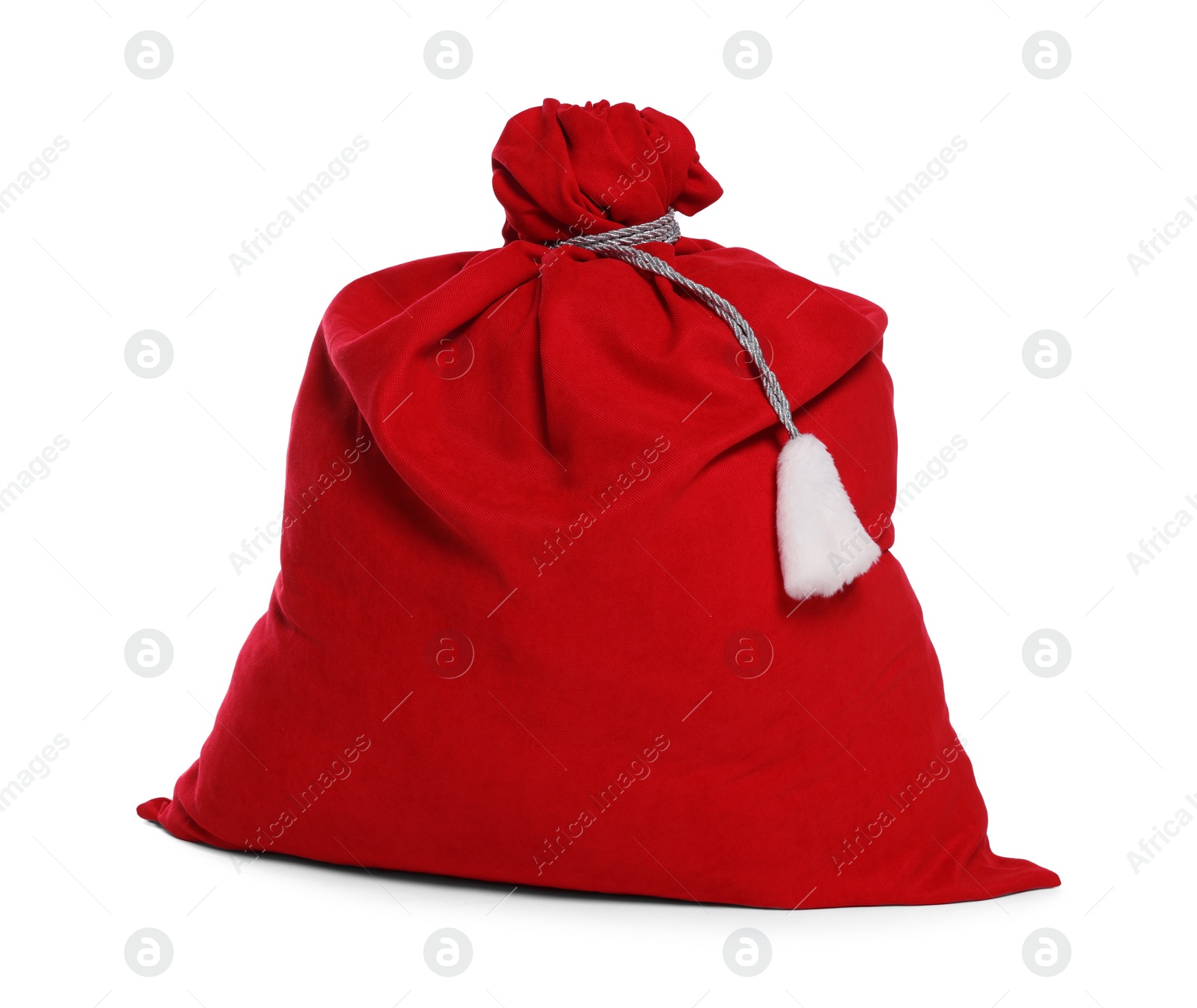 Photo of Santa Claus red bag full of presents isolated on white