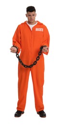 Photo of Prisoner in orange jumpsuit with chained hands on white background