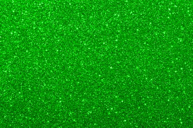 Image of St. Patrick day. Green glitter as background