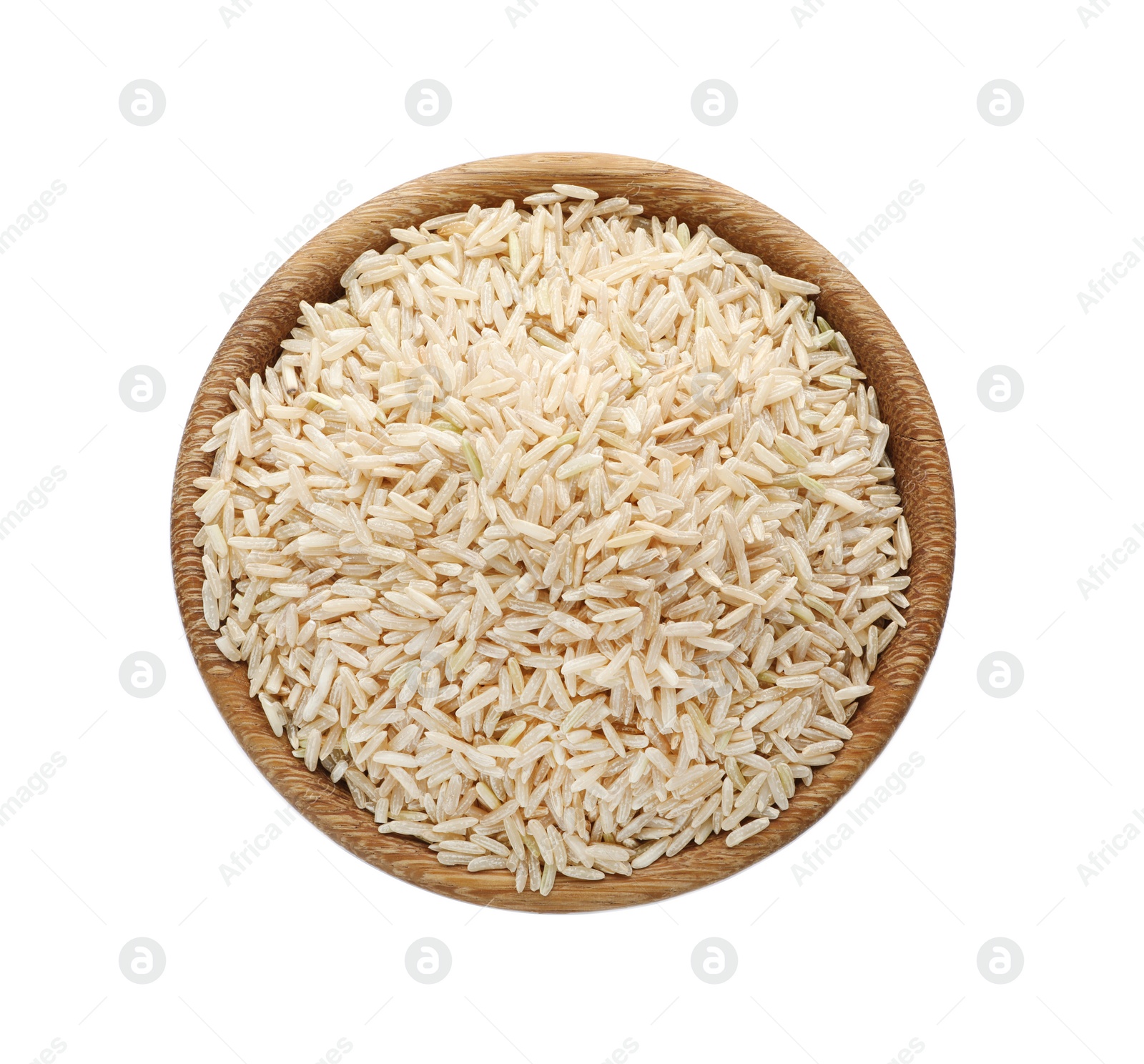 Photo of Wooden bowl with brown rice on white background, top view