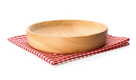 Photo of Empty wooden plate and checkered napkin isolated on white