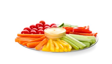 Plate with celery sticks, other vegetables and dip sauce isolated on white