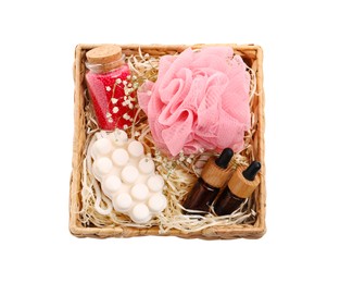 Photo of Spa gift set of different luxury products in wicker basket on white background, top view