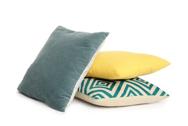 Different colorful decorative pillows on white background