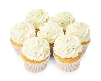 Photo of Tasty vanilla cupcakes with cream isolated on white