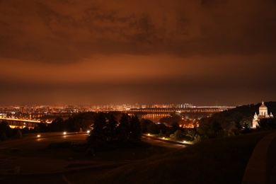 Beautiful view of bridge with illumination in modern city at night