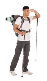 Photo of Male hiker with backpack and trekking poles on white background