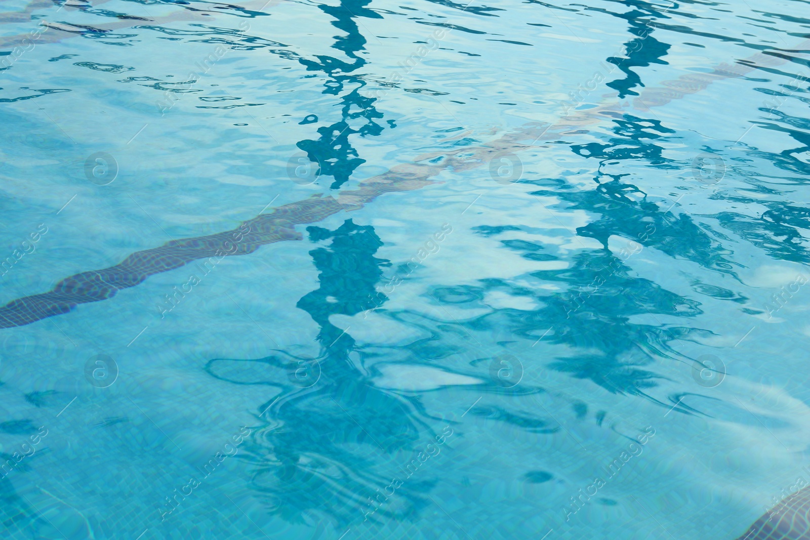 Photo of Outdoor swimming pool with clear rippled water