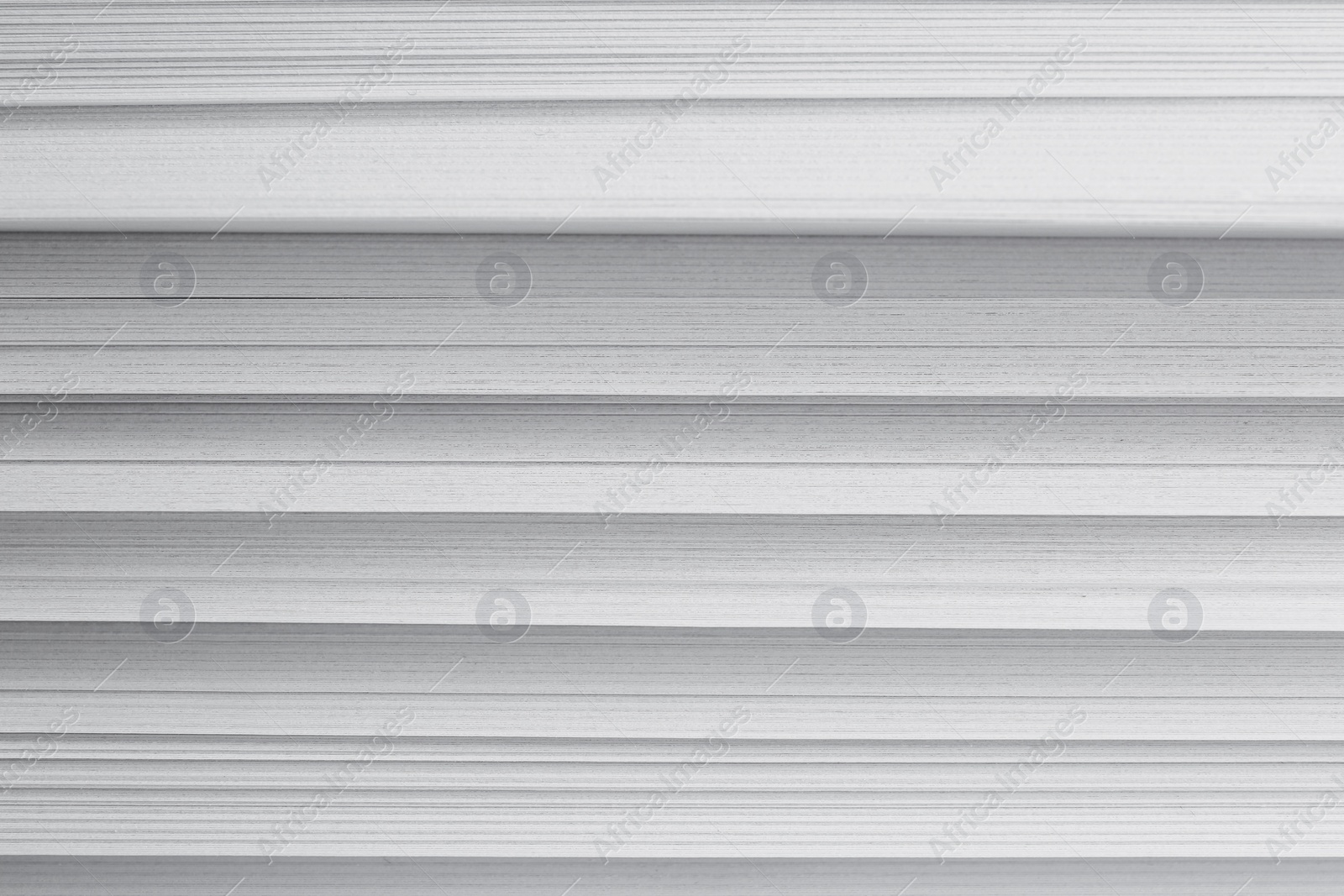 Photo of Stack of blank white paper as background, closeup