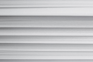 Photo of Stack of blank white paper as background, closeup