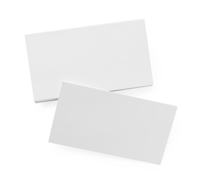 Blank business cards isolated on white, top view. Mockup for design