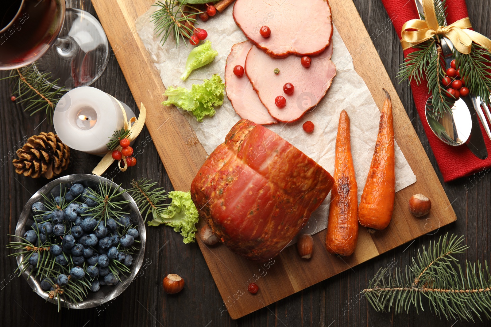 Photo of Flat lay composition with delicious ham on black wooden table. Christmas dinner