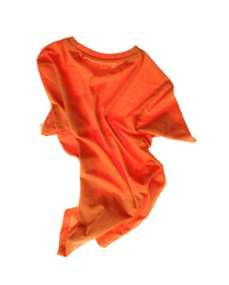 Photo of Rumpled orange t-shirt isolated on white. Messy clothes