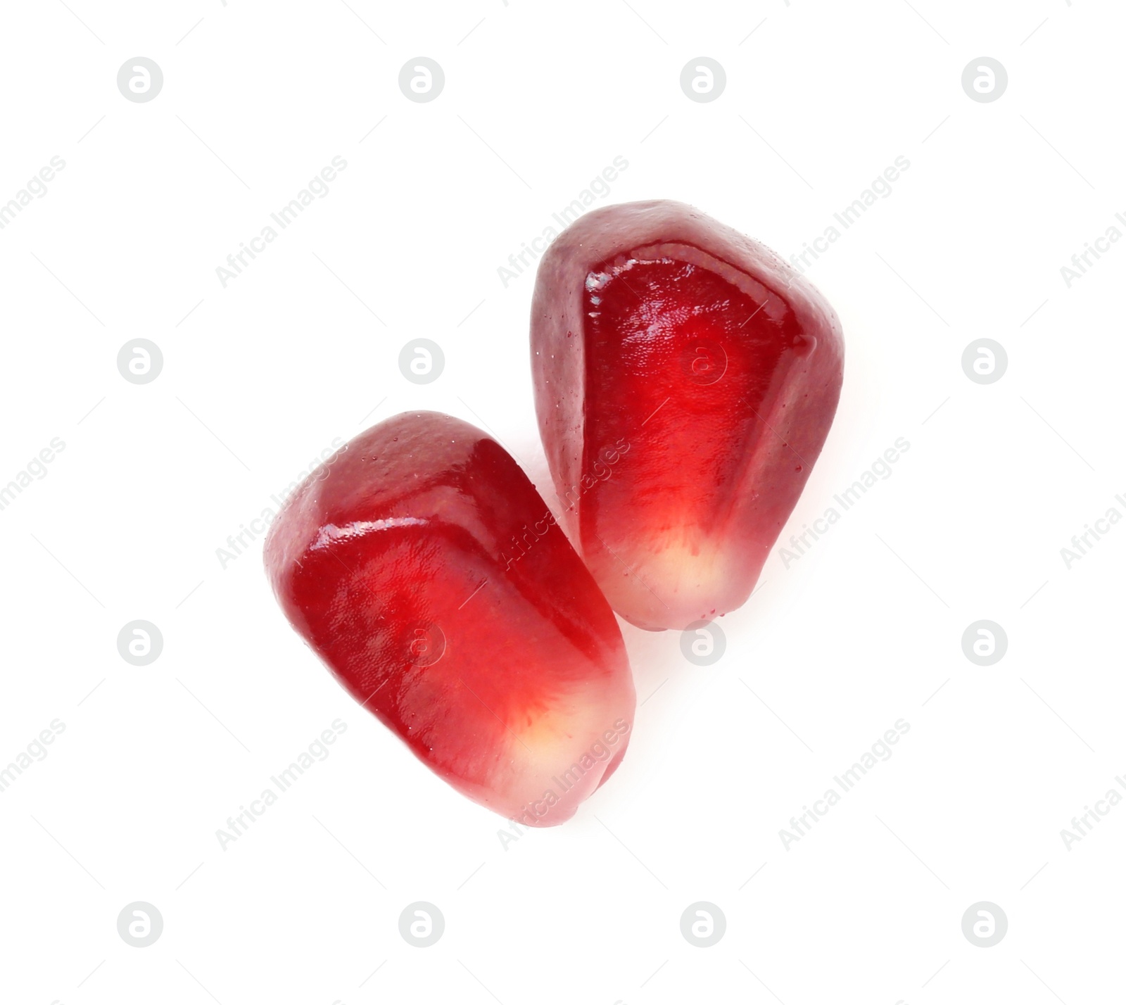 Photo of Ripe juicy pomegranate grains isolated on white, top view