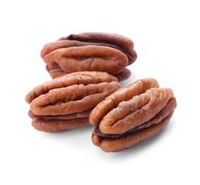 Photo of Ripe shelled pecan nuts on white background