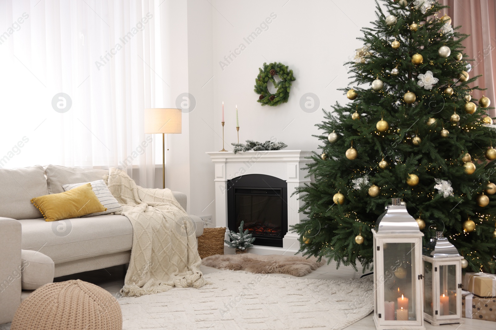 Photo of Christmas tree in furnished living room. Festive interior design