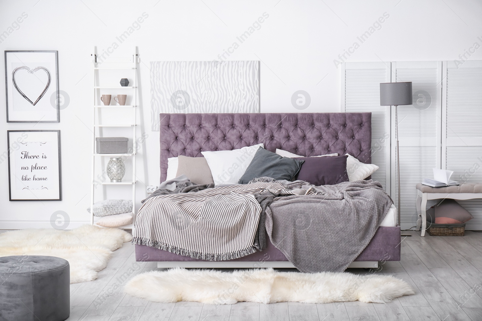 Photo of Bedroom interior with comfortable soft bed