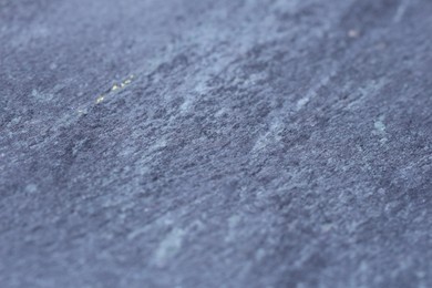 Photo of Texture of black marble surface as background, macro view