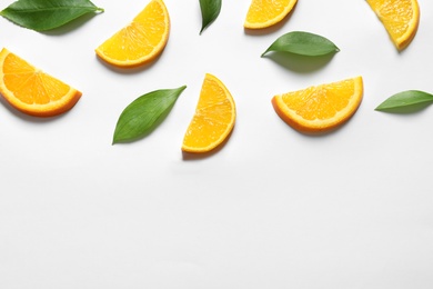 Photo of Composition with orange slices on white background, top view