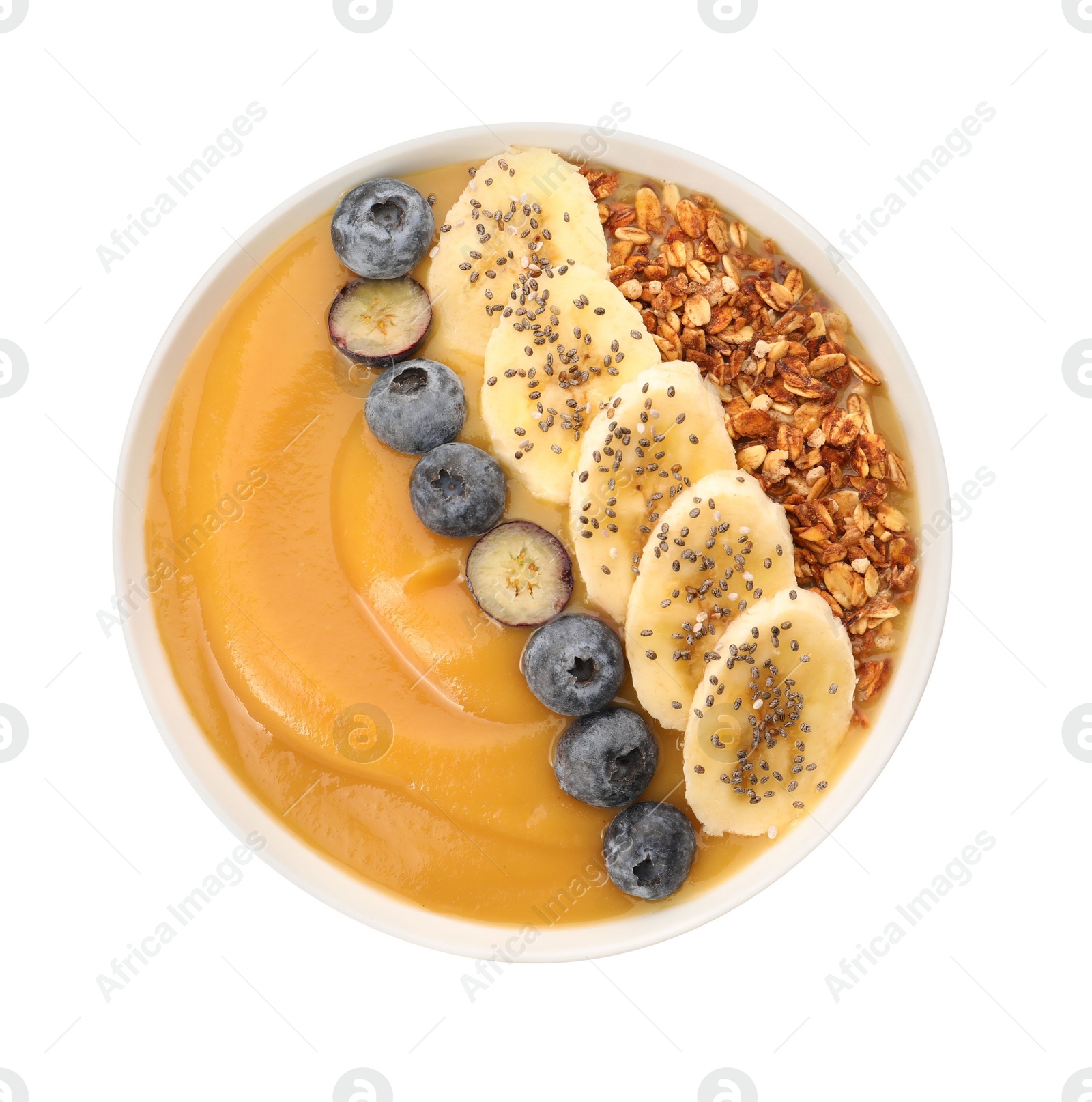 Photo of Delicious smoothie bowl with fresh blueberries, banana and granola on white background, top view