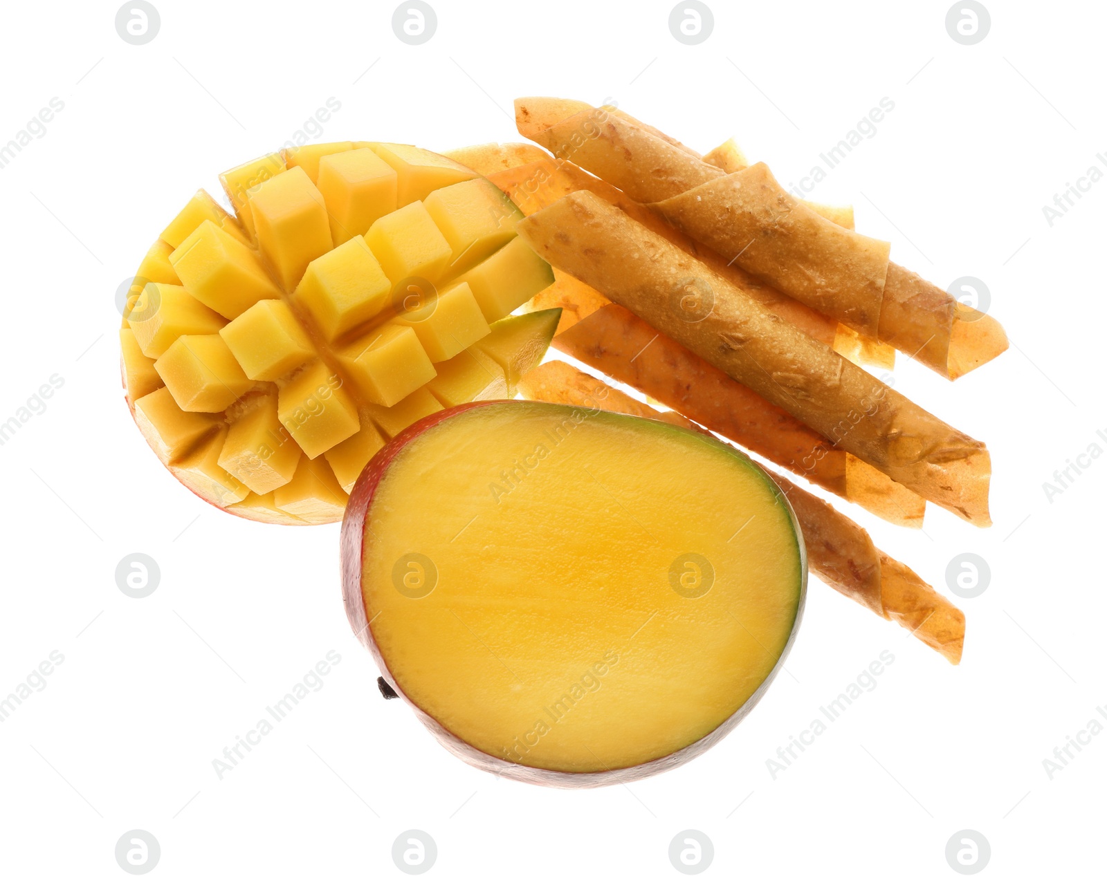 Photo of Delicious fruit leather rolls and mango on white background, top view