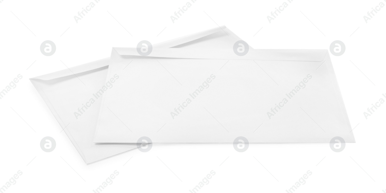 Photo of Two simple paper envelopes on white background