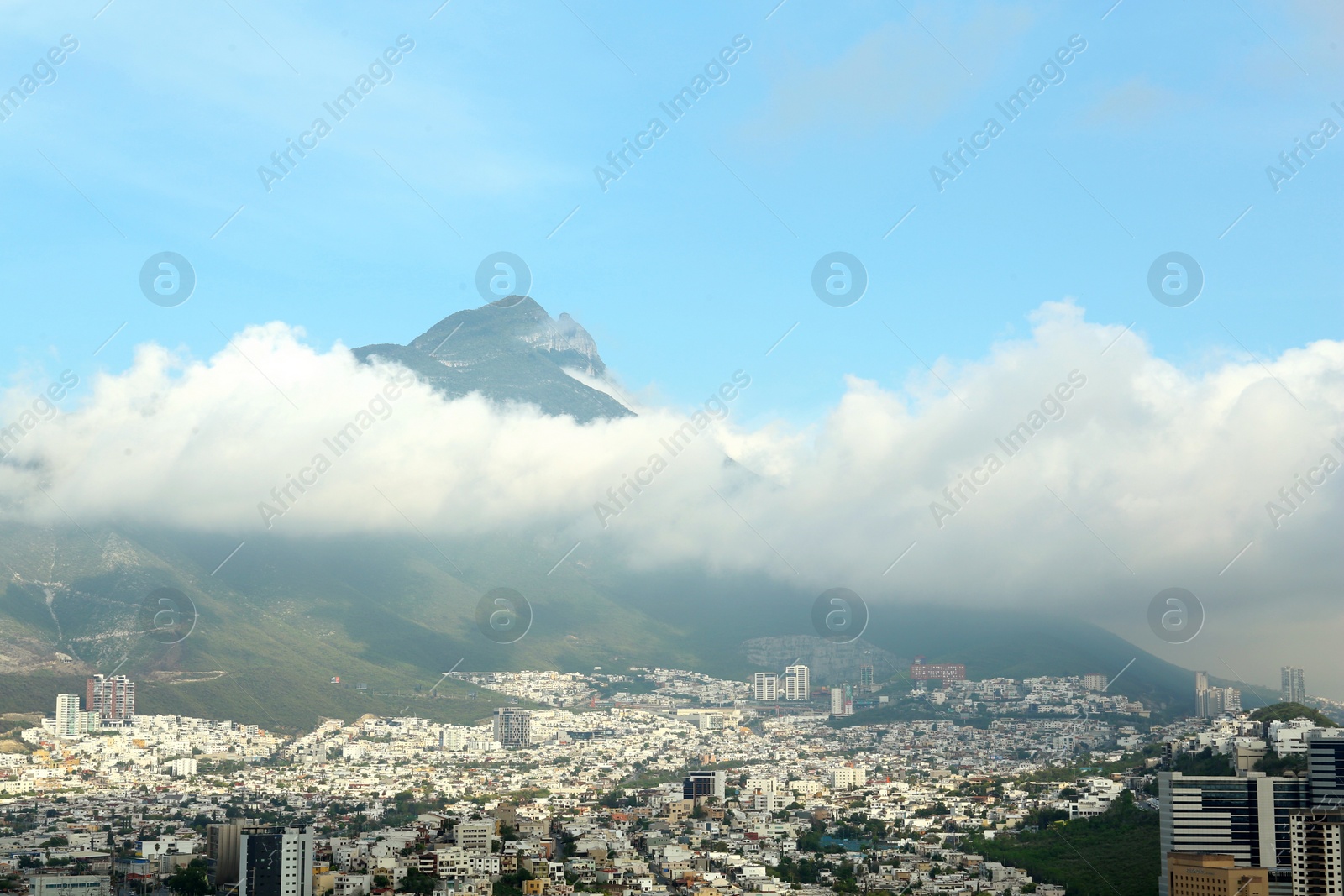 Photo of Picturesque view of beautiful cityscape near mountain