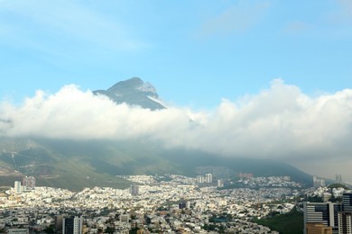 Photo of Picturesque view of beautiful cityscape near mountain